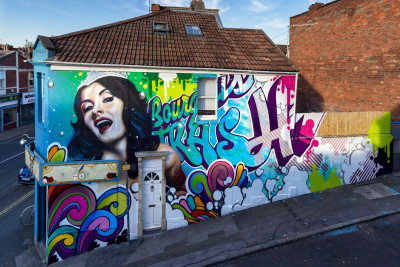 Bookshop in Bristol with graffiti wall art by Soulful Creative