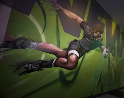 Close-up of a painted rugby player diving with the ball across a green background, part of the Newcastle mural.