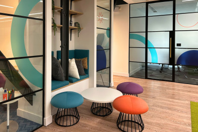 Nexthink office glass manifestation with seating area