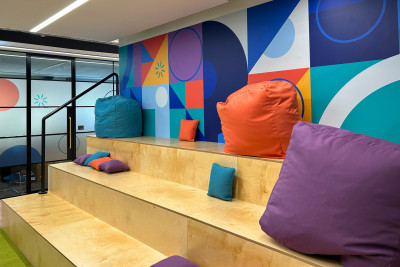 Nexthink office wall graphics with plywood seating area