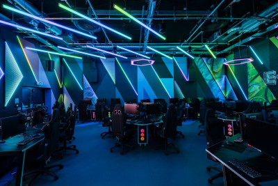 Blue LED lighting effect onto hand painted murals at the new E-Sports Arena at St Mary's University in Twickenham